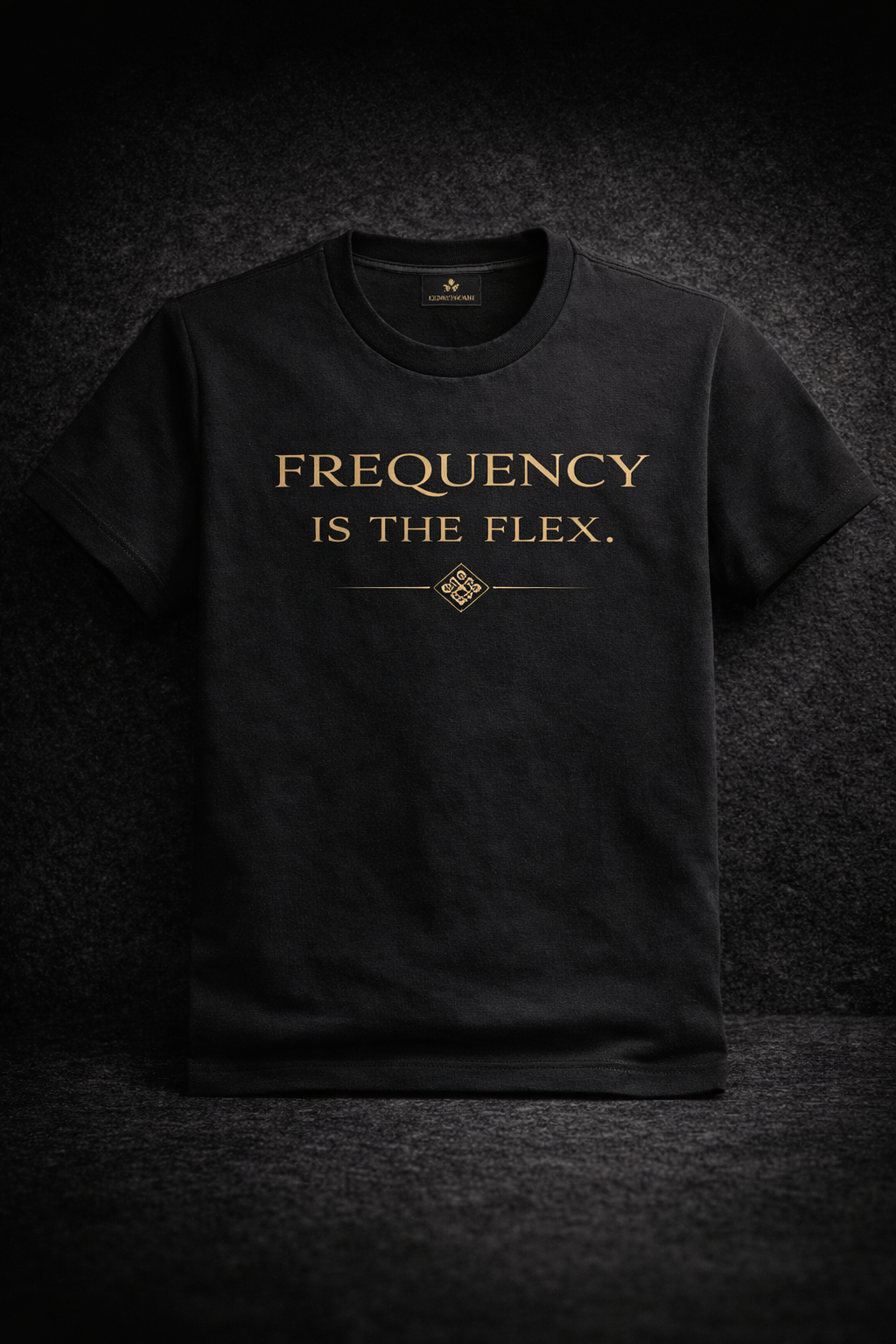 Black OmDhvani Sacred Geometry Tee with a gold design